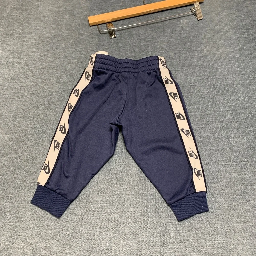 Nike Sweatpants Boys 2T Blue Fleece Lined Elastic Waist Swoosh Logo Tapered Leg